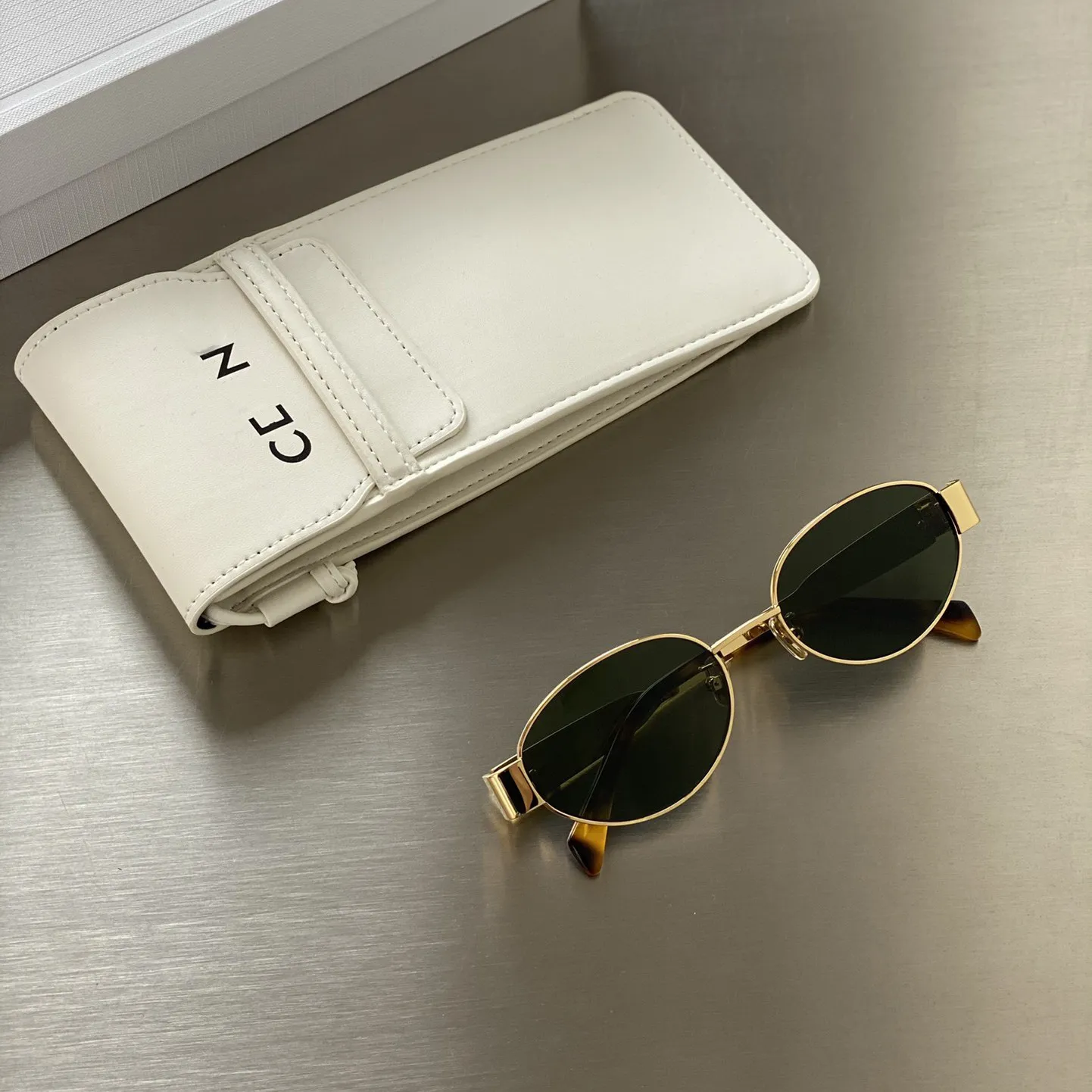 10a Arc de triomphe marco ovalado Gafas de sol Mujeres Mirror de metal Piernas Gafas de sol de diseñador de diseño