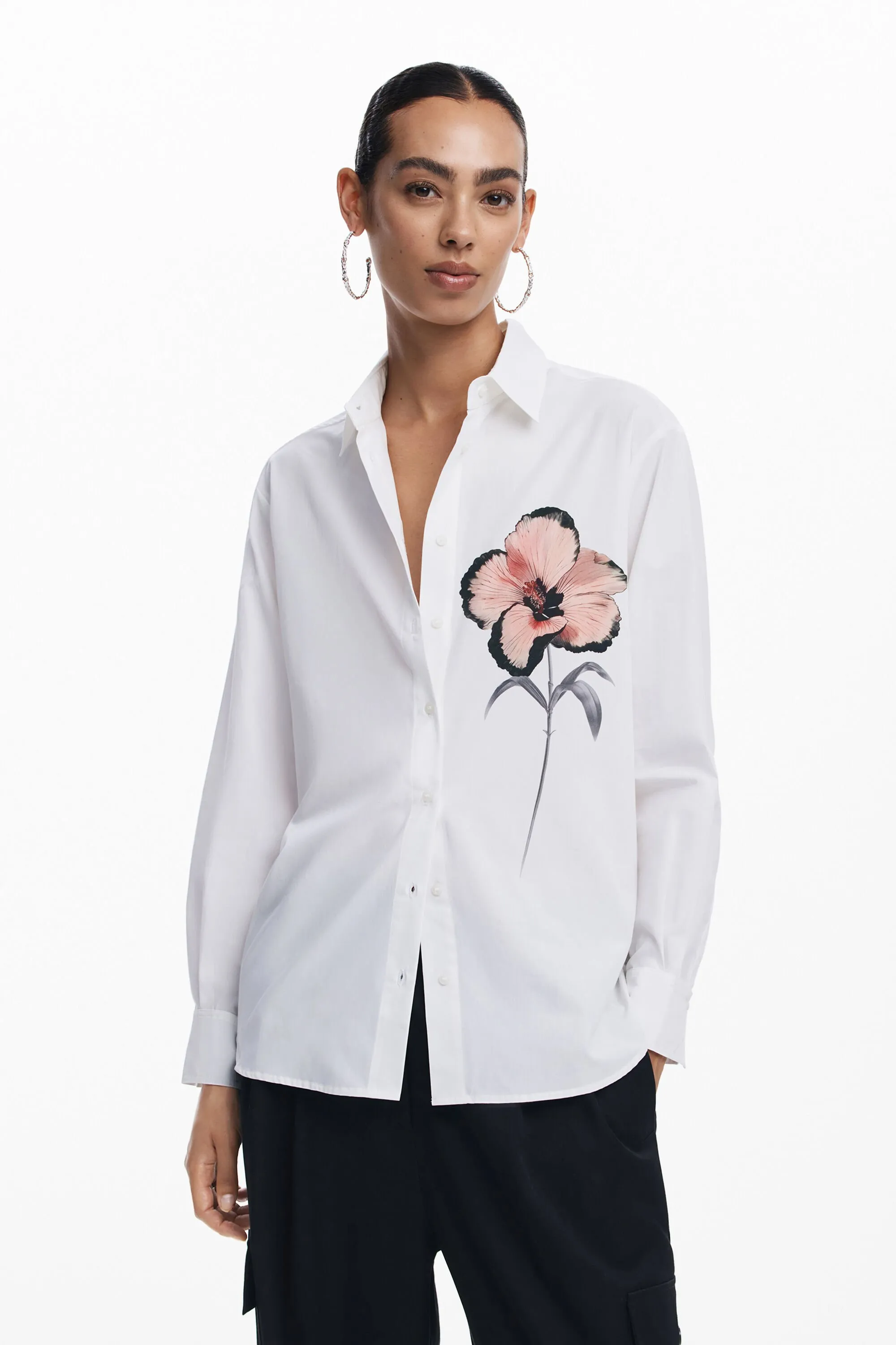 Camisa flor pecho
